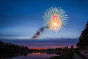 Fireworks Over Lake at Night